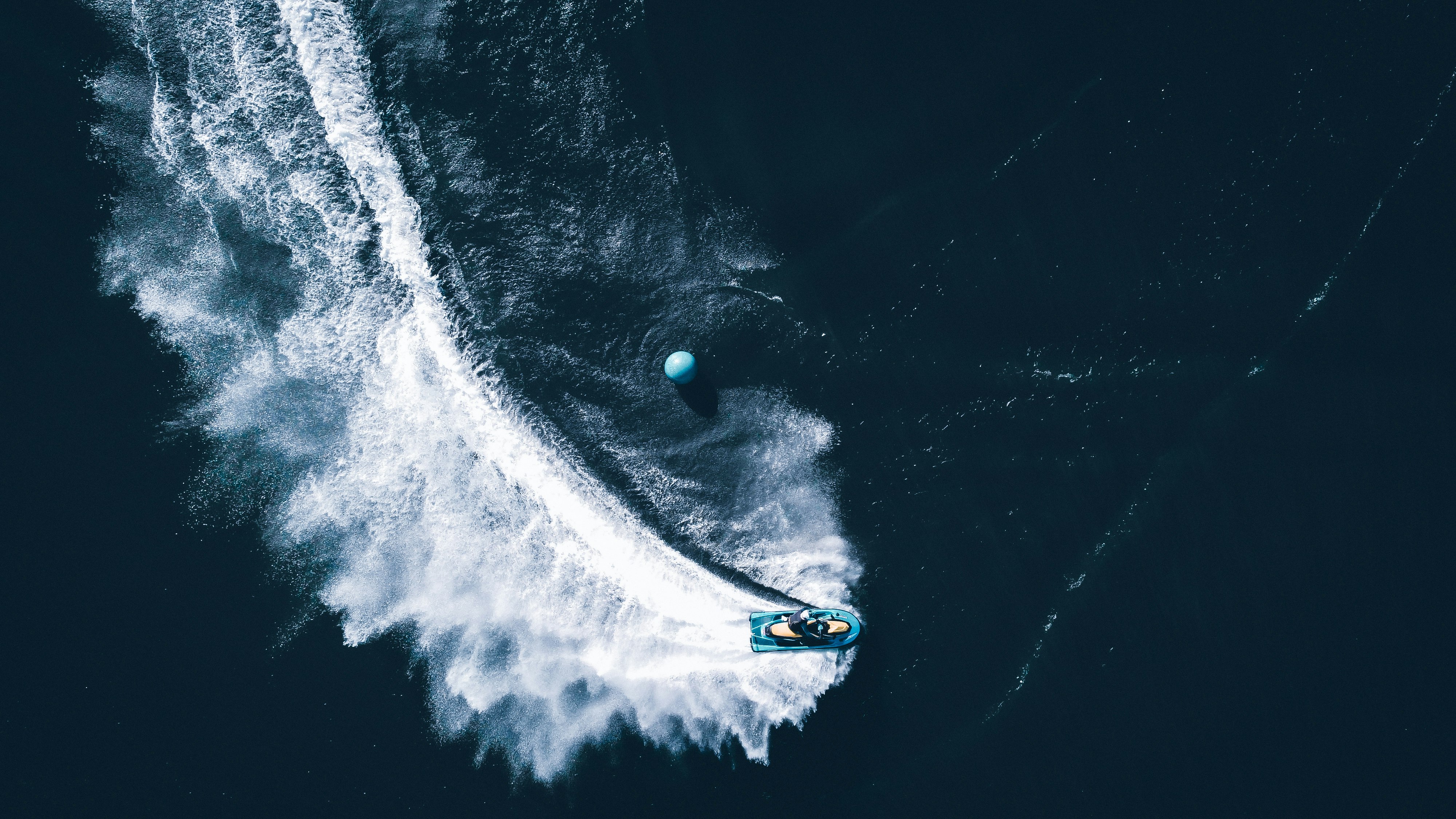 aerial view of boat on sea during daytime